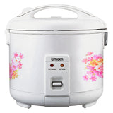 Tiger JNP rice cooker with a white floral body, carrying handle, front switch and Rice Cooking and Keep Warm indicator lights.