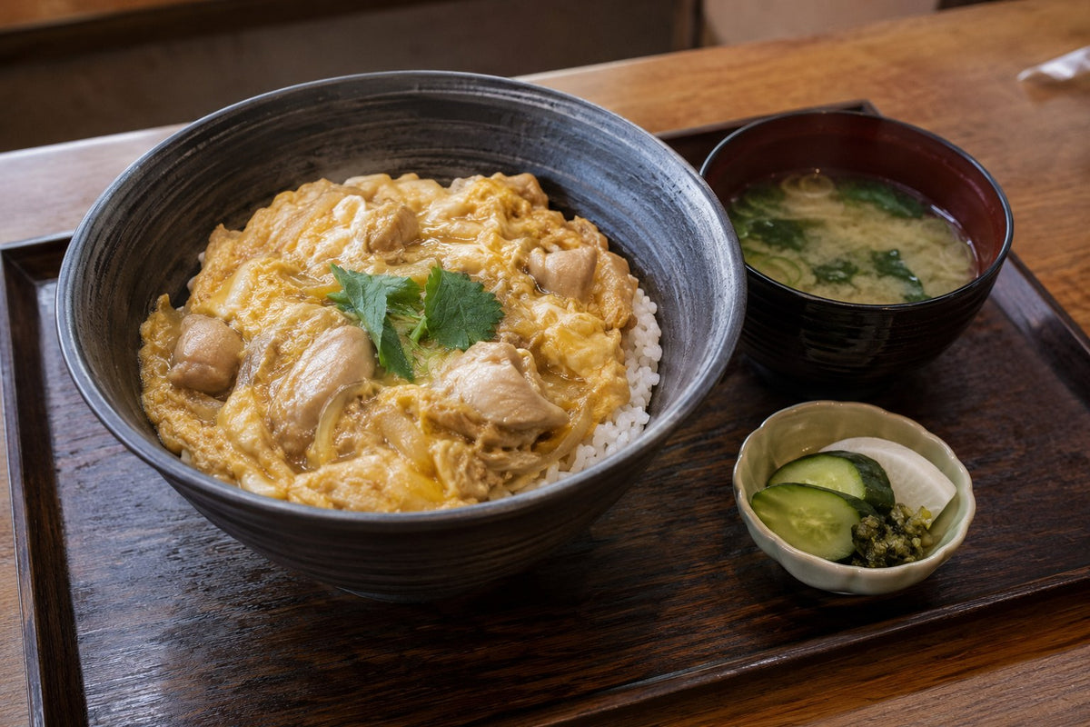 A lean meal service: the primary rice bowl, soup and one small supporting dish.