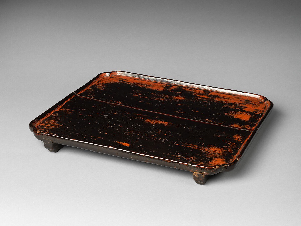 Angoya-type Negoro tray, dated 1384; black and red lacquer on a rectangular wooden body with short slat feet