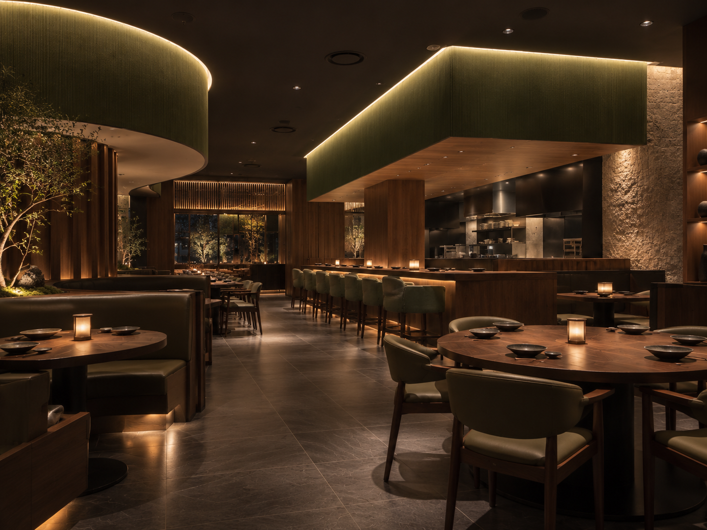 Modern Japanese dining room with dark wood tables, upholstered seating and warm lighting.